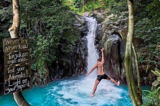 All Inclusive : Jumping Sliding at Aling- Aling Waterfall - Handara Gate - Lunch - Aling-Aling Waterfall: where the adrenaline actually happens