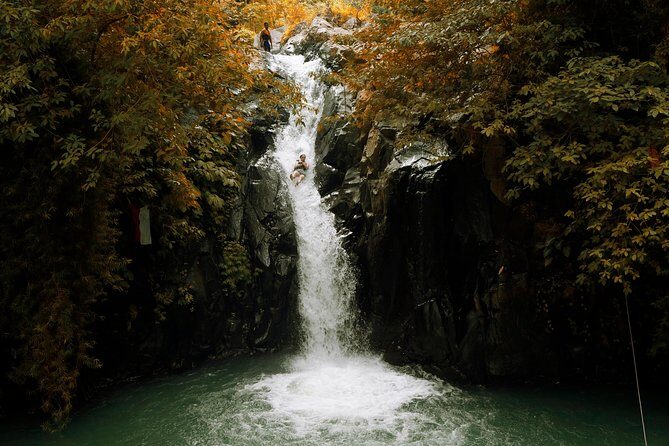 Cliff Jumping and Sliding at Aling Aling Waterfall - North Bali waterfall time: what this 3-hour combo trip gives you
