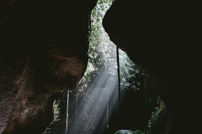 Lempuyang Gates of Heaven, Tirta Gangga Temple Swim & Jungle Waterfalls - Tukad Cepung Waterfall: cave rays, swimming time, and camera discipline