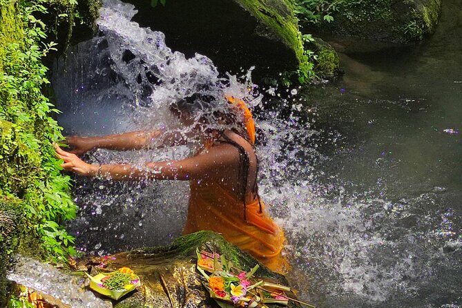 Melukat Purification Ceremony at Mengening Temple - The spring-fed cleansing bath: what to expect and how to handle it
