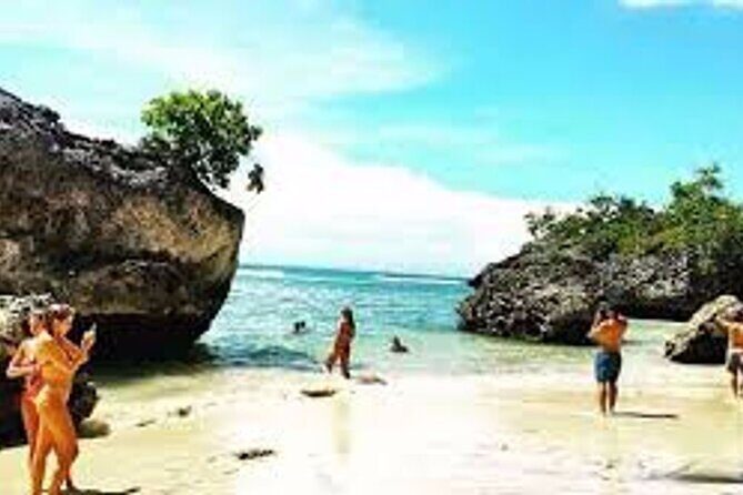 Private Tour Uluwatu Sunset Kecak Dance and Dinner at Jimbaran - Stop 1: Padang Padang Beach for Surf Views and Breathing Space