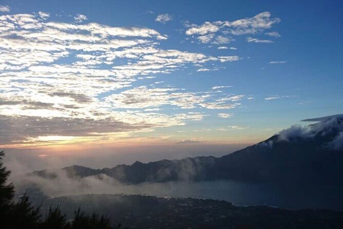 Sharing Mount Batur Sunrise Trekking Guide Pick Up and Drop Off - Private Guide Perks: English-Speaking, Safety-Focused, and Handy on Slippery Parts