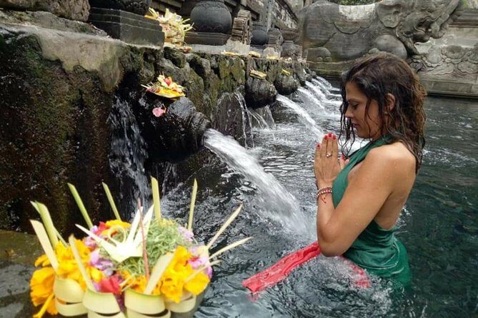 Skip the Line Tirta Empul Temple Entrance Ticket All Inclusive - Walking the temple route with an English-speaking escort