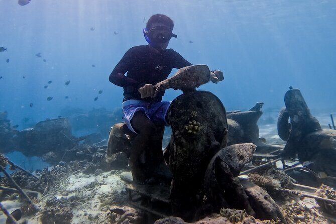 Snorkeling with turtle and statue in Gilis - Key Things I’d Focus On Before You Go