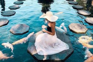 The Gates of Heavan - Ubud Jungle Swing & Waterfall Tour - Tirta Gangga Water Palace: calm pools, fountains, and statues