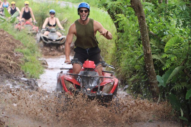 Ubud ATV Quad Bike and Snorkeling at Blue Lagoon Beach - The ATV ride: jungle tracks, tunnel, waterfall, rice fields, and river crossings