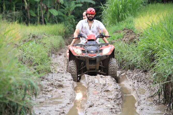 Ubud ATV Quad Bike with Ayung River Rafting Experience - ATV quad biking after lunch: rice fields, waterfalls, and tunnel moments