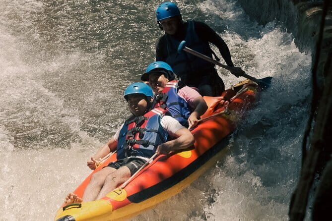 Ubud Ayung River Rafting with Meeting Point or Pickup - The Views: Waterfalls, Cliff Carvings, and Rice-Terrace Scenery